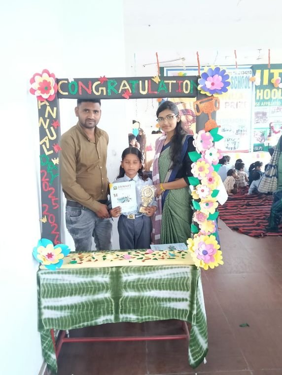 Students receiving certificates with teachers at Janhit World School