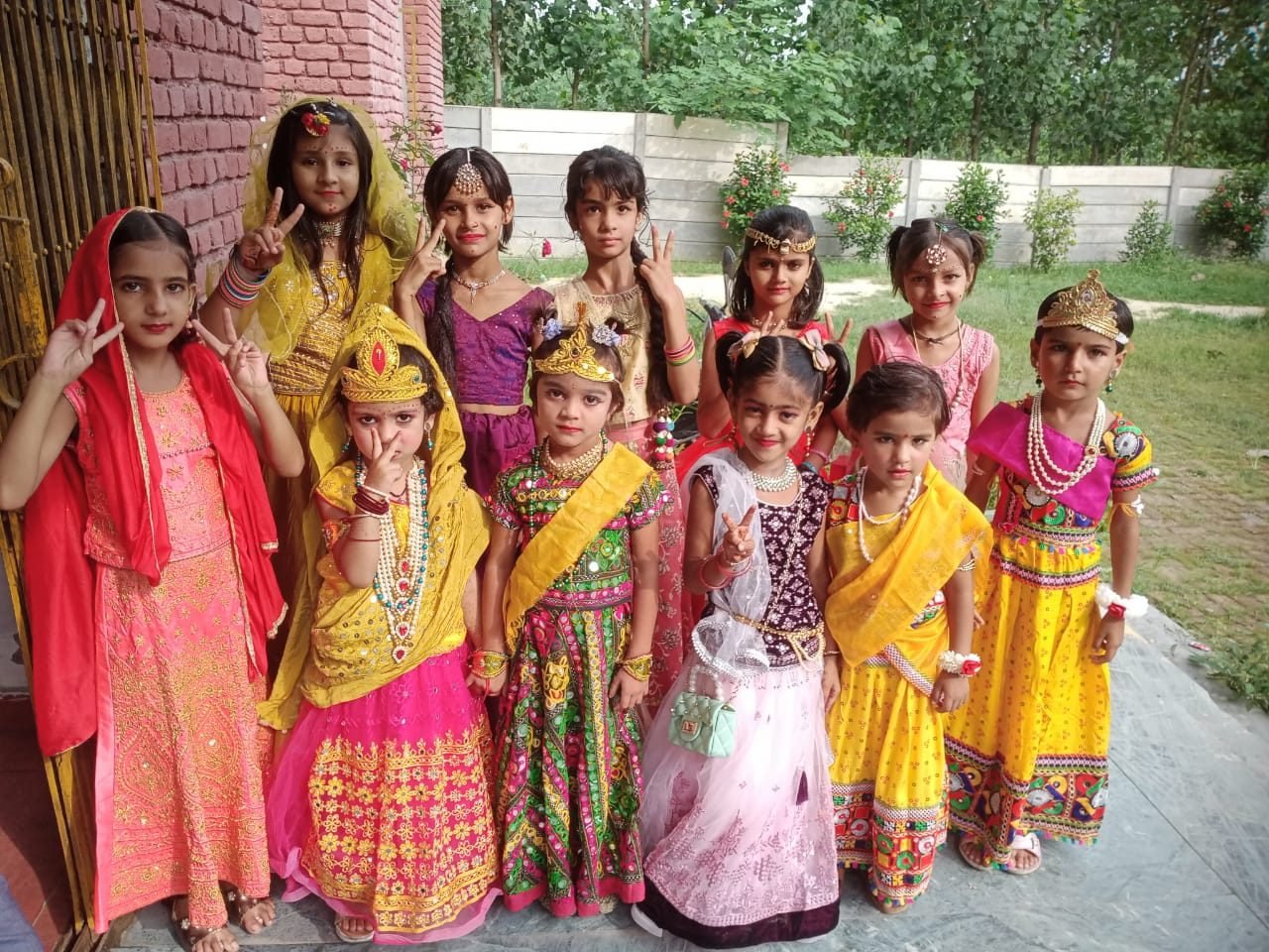 Students of Janhit World School in traditional dress for the Janmashtami celebration
